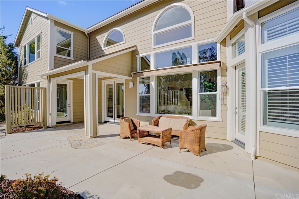 1715 Trilogy Parkway Nipomo, CA 93444 - Photo 56 of 69 a building outdoor space with patio furniture and potted plants