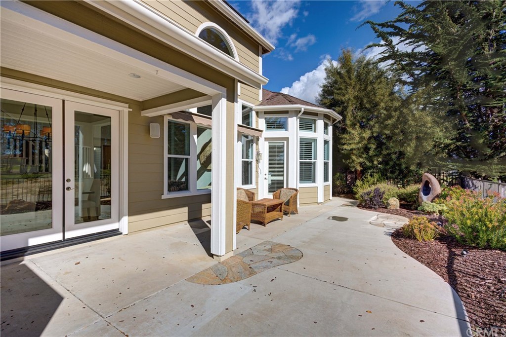 1715 Trilogy Parkway Nipomo, CA 93444 - Photo 57 of 69 a view of a house with backyard porch and sitting area