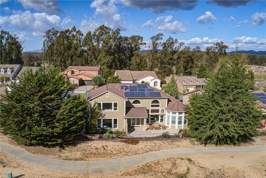 1715 Trilogy Parkway Nipomo, CA 93444 - Photo 68 of 69 an aerial view of residential houses with outdoor space and trees