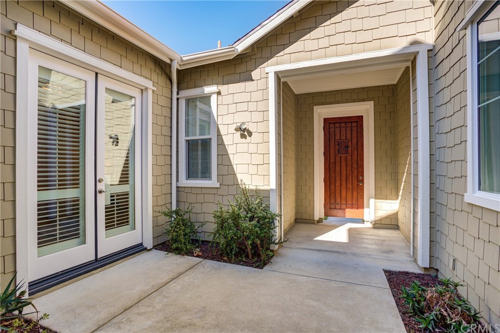 1715 Trilogy Parkway Nipomo, CA 93444 - Photo 8 of 69 a front view of a house with a yard