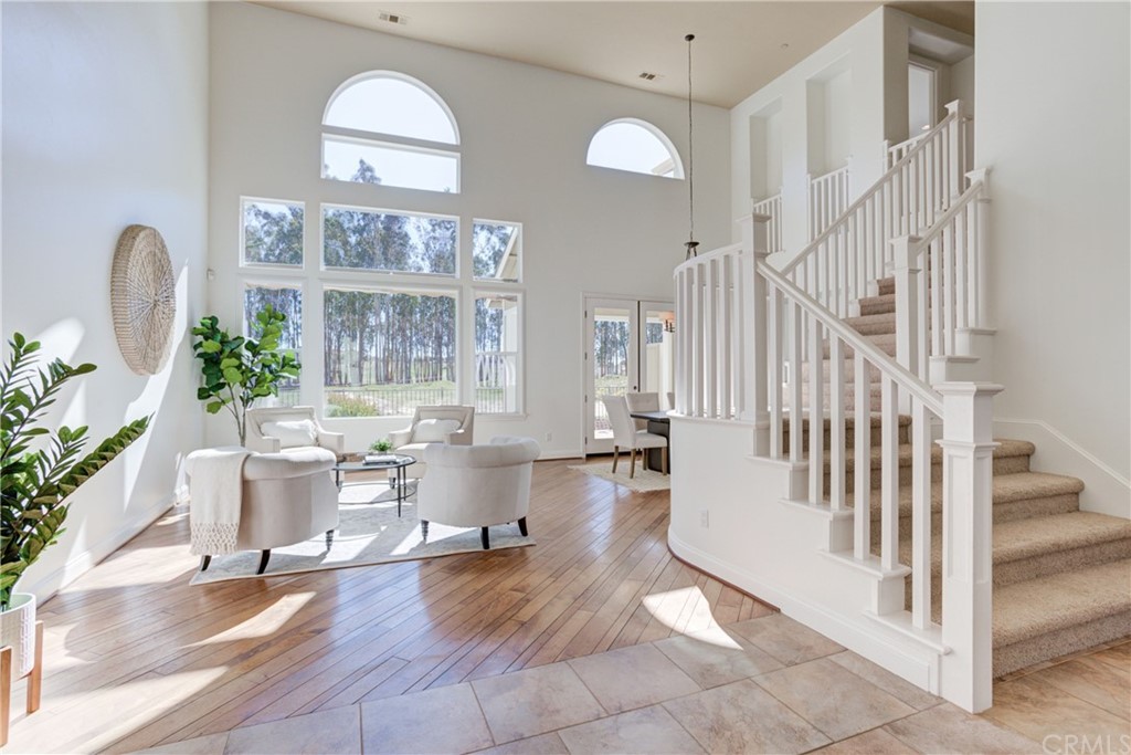 1715 Trilogy Parkway Nipomo, CA 93444 - Photo 9 of 69 a view of livingroom and dining room with wooden floor