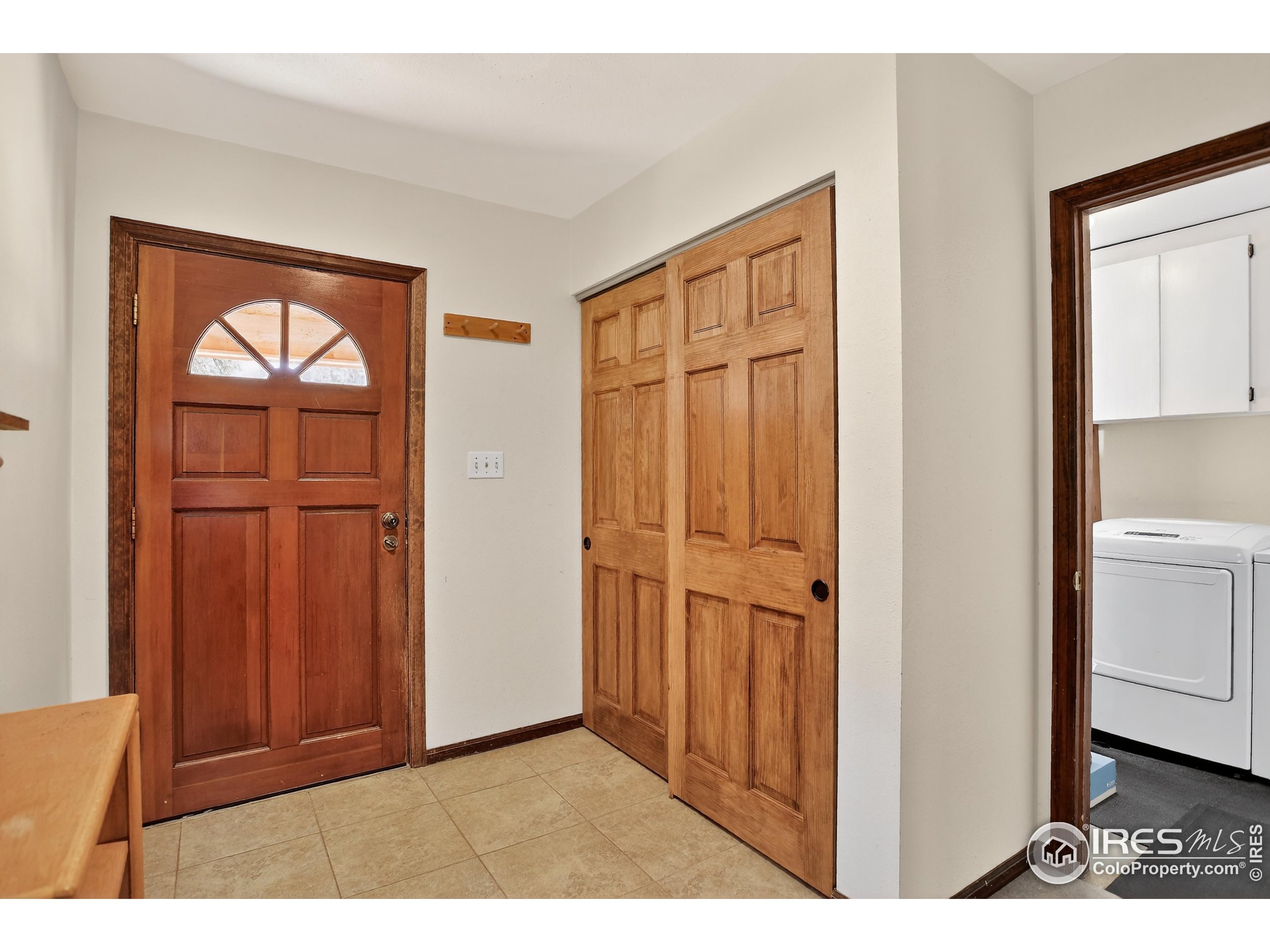 192 Nugget Hill Road Jamestown, CO 80455 - Photo 4 of 25 a view of an entryway with a hardwood floor
