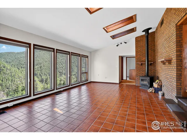 a view of a living room with windows