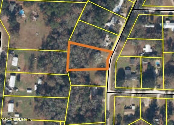 8810 Eastwood Road Macclenny, FL 32063 - Photo 1 of 1 a bathroom with a glass shower door