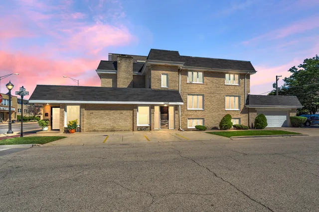 front view of a house with a street