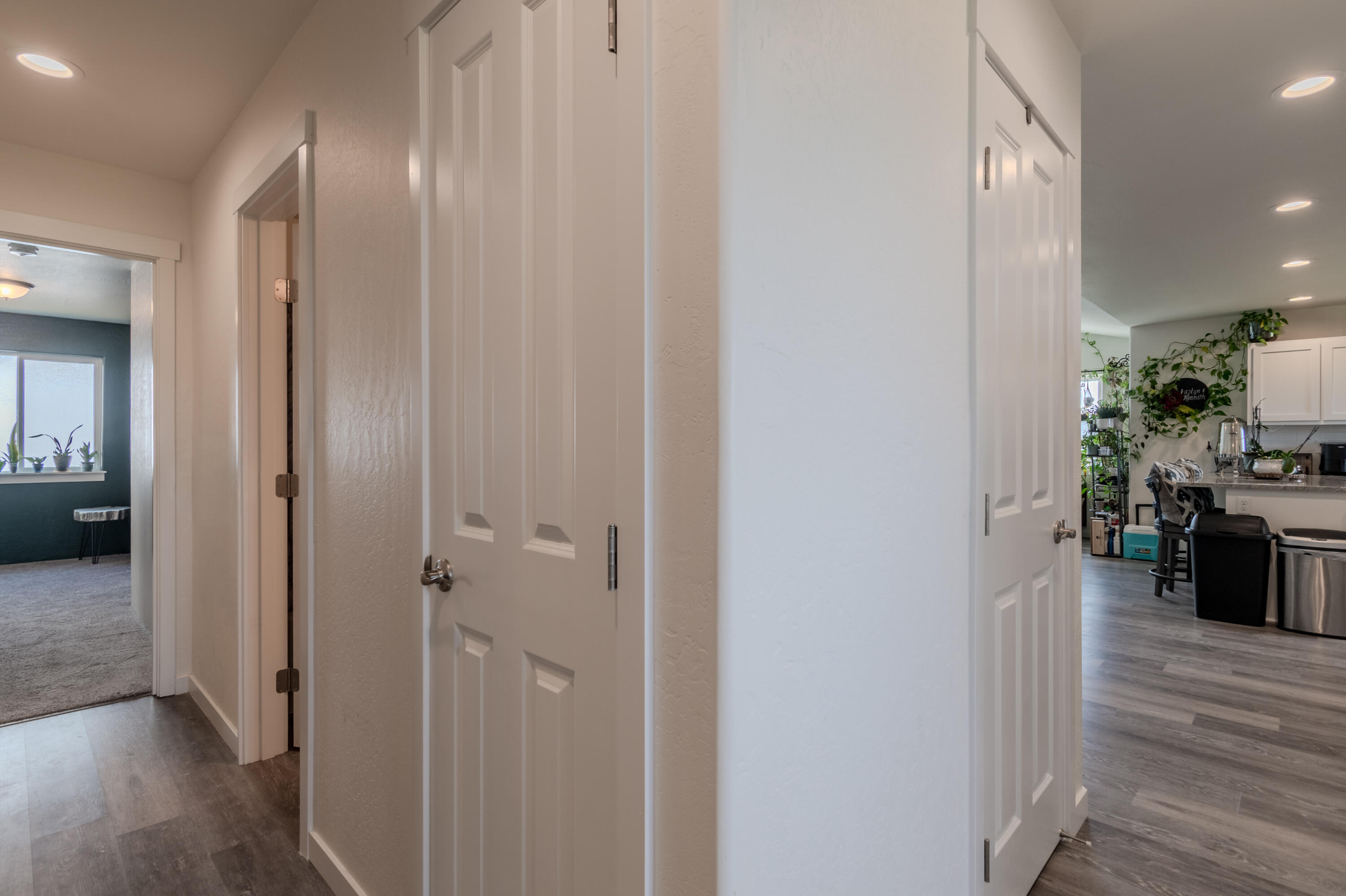 21 Cerulean Terrace Eagle Point, OR 97524 - Photo 17 of 30 a view of a hallway with living room and wooden floor