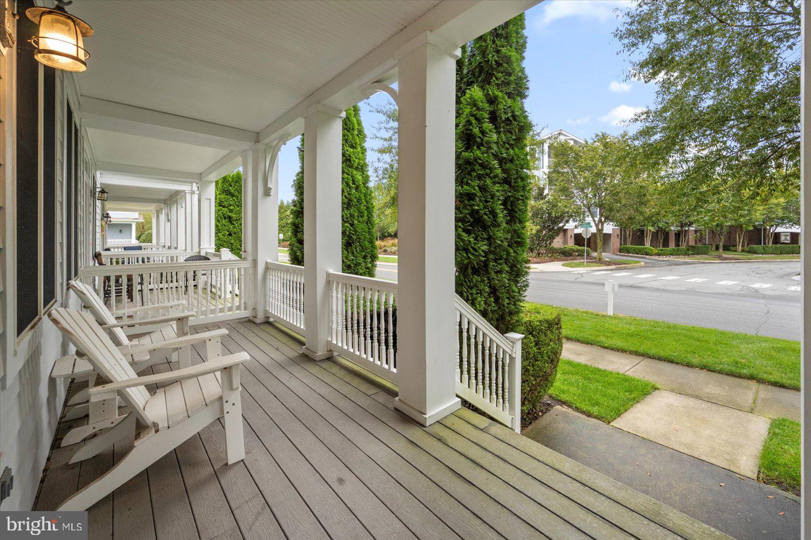 11446 West Sand Cove Road Selbyville, DE 19975 - Photo 5 of 104 a view of a porch with wooden floor and fence