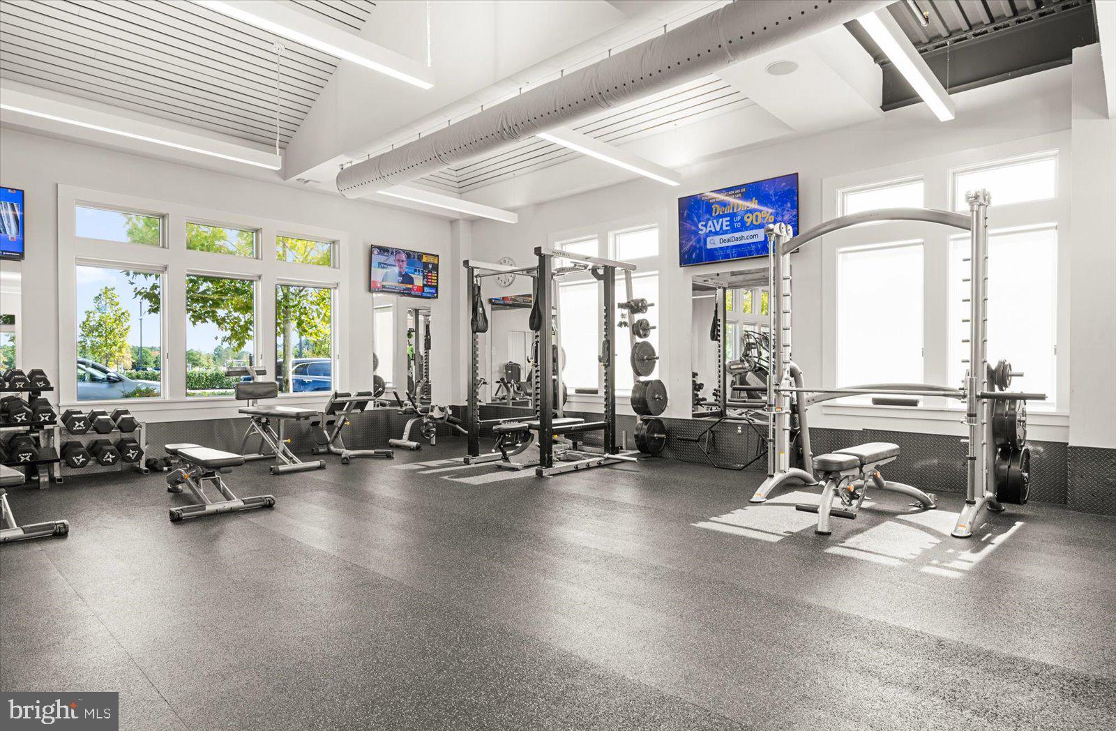 11446 West Sand Cove Road Selbyville, DE 19975 - Photo 84 of 104 a view of a room with gym equipment