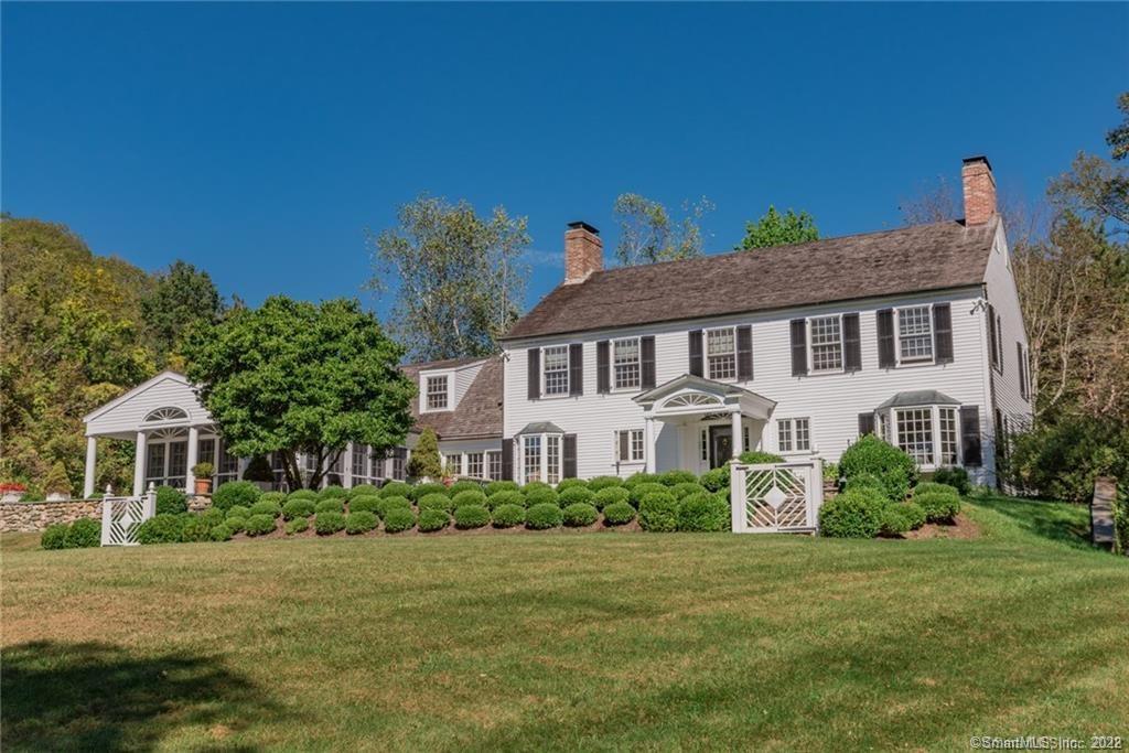 13B Geer Hill Road Lyme, CT 06371 - Photo 1 of 1 a front view of a house with a garden