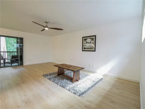 a kitchen with stainless steel appliances granite countertop a sink and a stove top oven