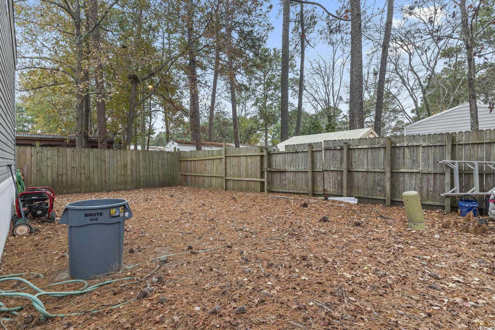 91 Offshore Drive Murrells Inlet, SC 29576 - Photo 21 of 24 View of fenced backyard