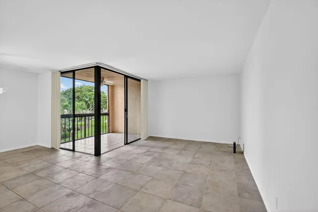 a kitchen with stainless steel appliances a sink and a stove