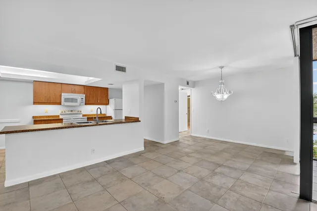 a view of a room with a large window