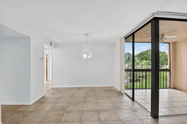 a kitchen that has a sink and a stove