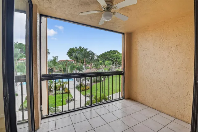 a bathroom with a sink a toilet a mirror a bathtub and shower
