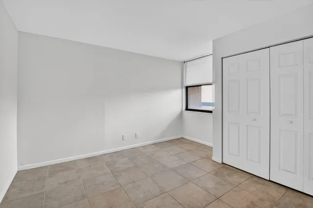 a front view of a building with garden