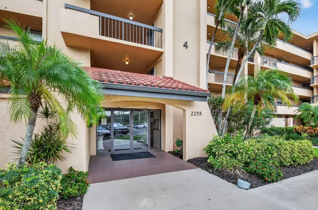 a open kitchen with a stove a sink dishwasher and a refrigerator