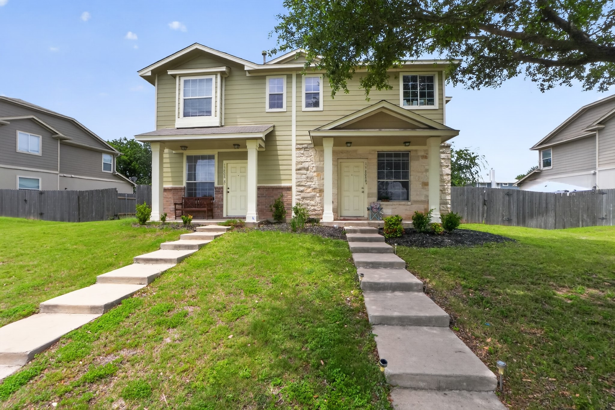 13808 Harris Ridge Boulevard Pflugerville, TX 78660 - Photo 1 of 40 a front view of a house with yard and green space