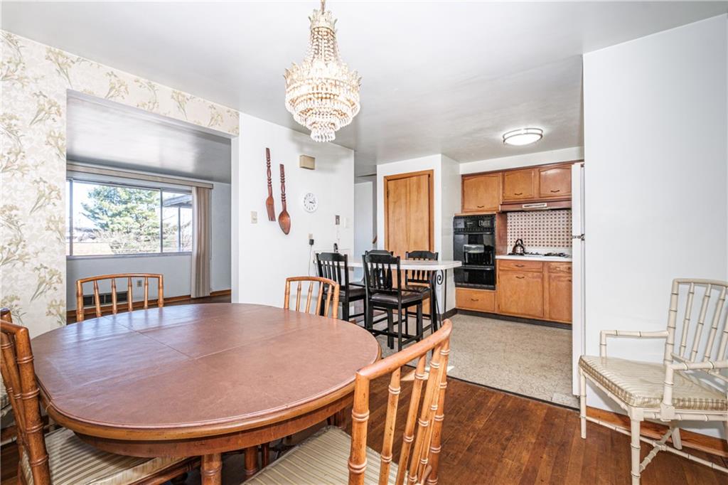 971 Sharon Road Beaver, PA 15009 - Photo 3 of 25 a view of a dining room with furniture window and wooden floor