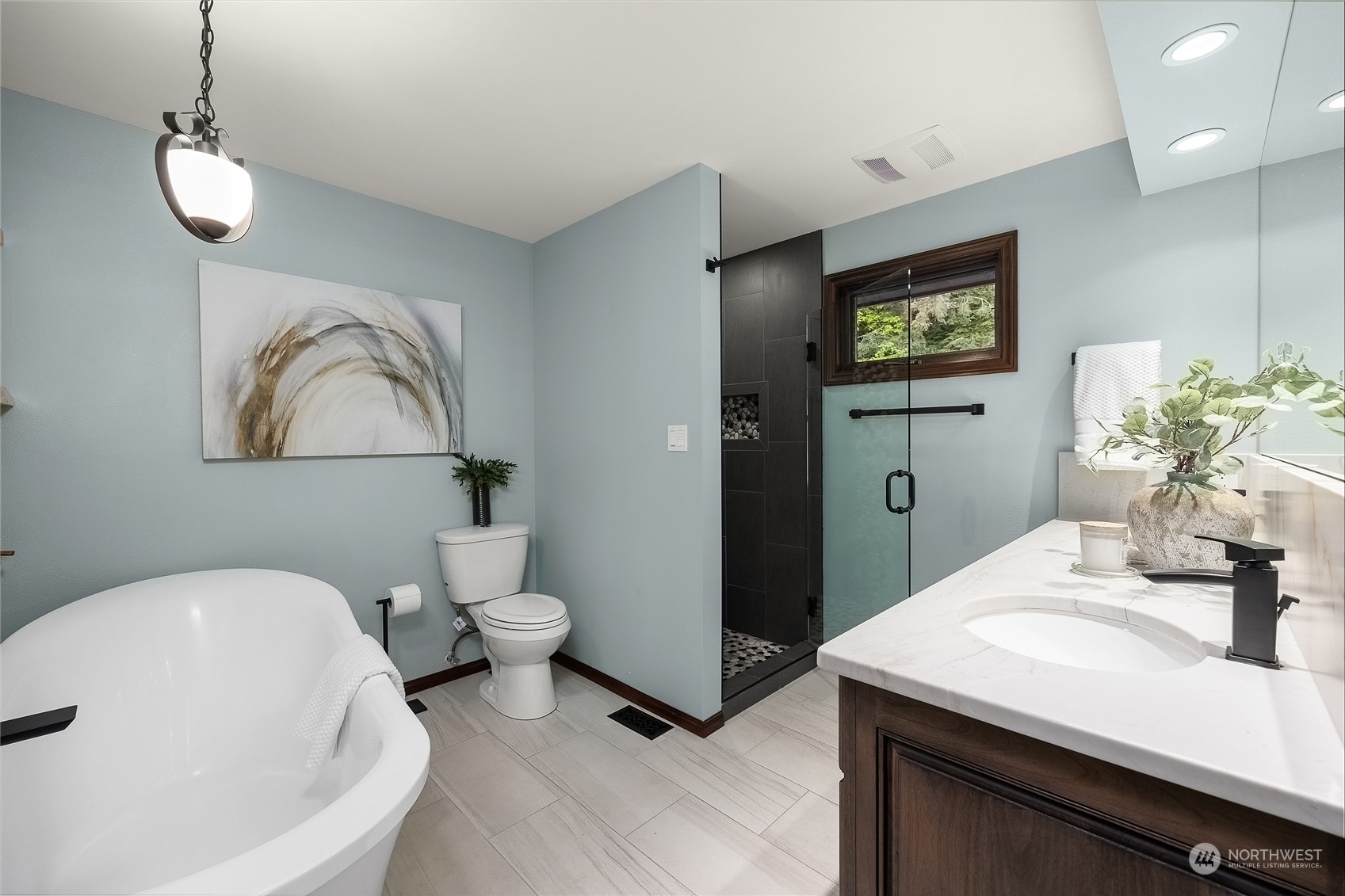 1818 Vernon Road Lake Stevens, WA 98258 - Photo 20 of 39 a bathroom with a sink a toilet and a mirror