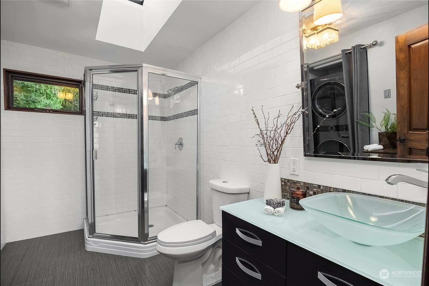 1818 Vernon Road Lake Stevens, WA 98258 - Photo 29 of 39 a bathroom with a sink a toilet and shower