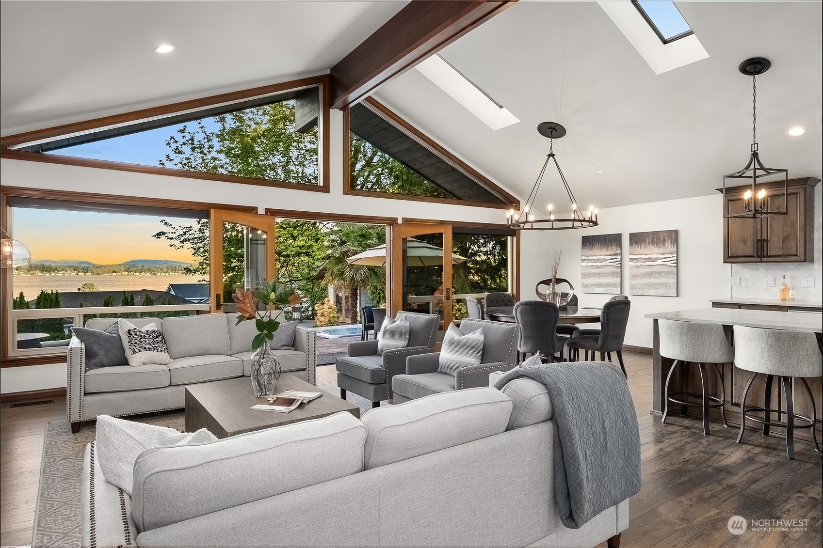 1818 Vernon Road Lake Stevens, WA 98258 - Photo 8 of 39 a living room with furniture a flat screen tv and floor to ceiling windows