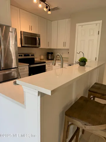 $305,000 | 1500 Calming Water Drive, Unit 5501, Fleming Island, FL 32003