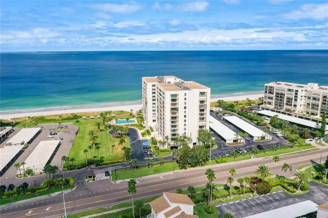 a view of a balcony with an outdoor seating