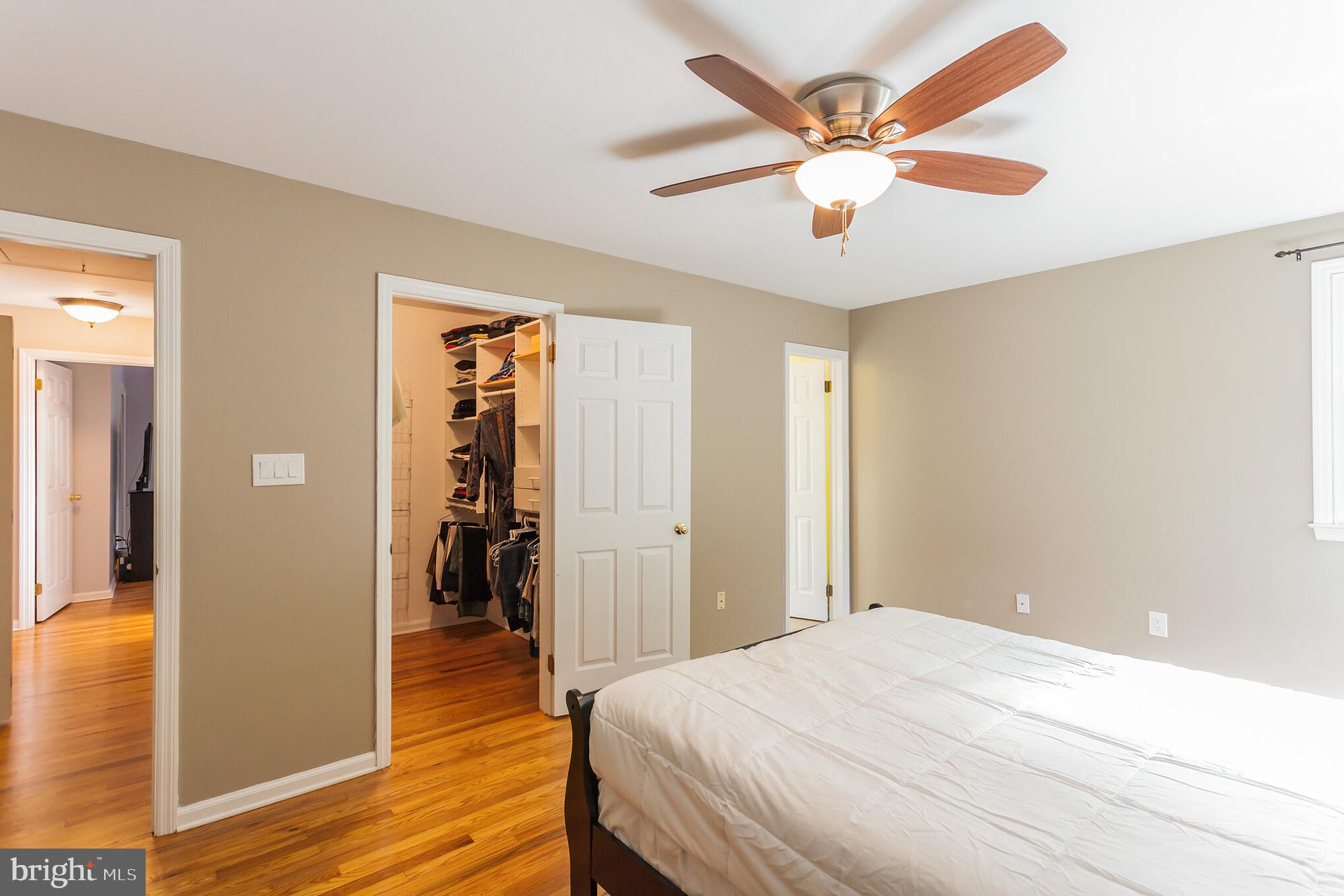 655 Chambers Rock Road Landenberg, PA 19350 - Photo 20 of 42 a bedroom with a bed and wooden floor