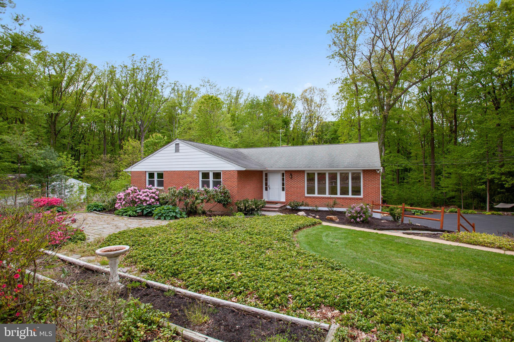 655 Chambers Rock Road Landenberg, PA 19350 - Photo 3 of 42 a view of a house with a big yard potted plants and large tree