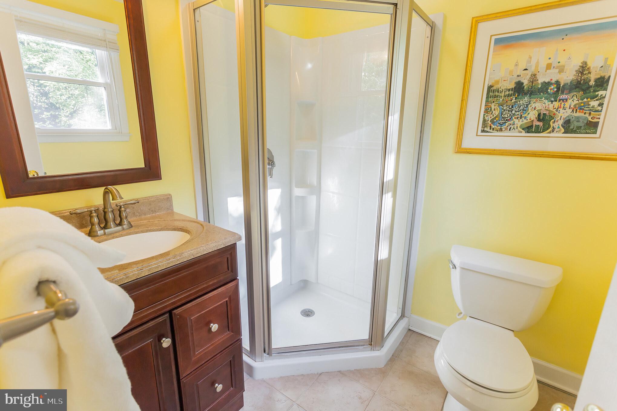 655 Chambers Rock Road Landenberg, PA 19350 - Photo 21 of 42 a bathroom with a granite countertop toilet sink and mirror