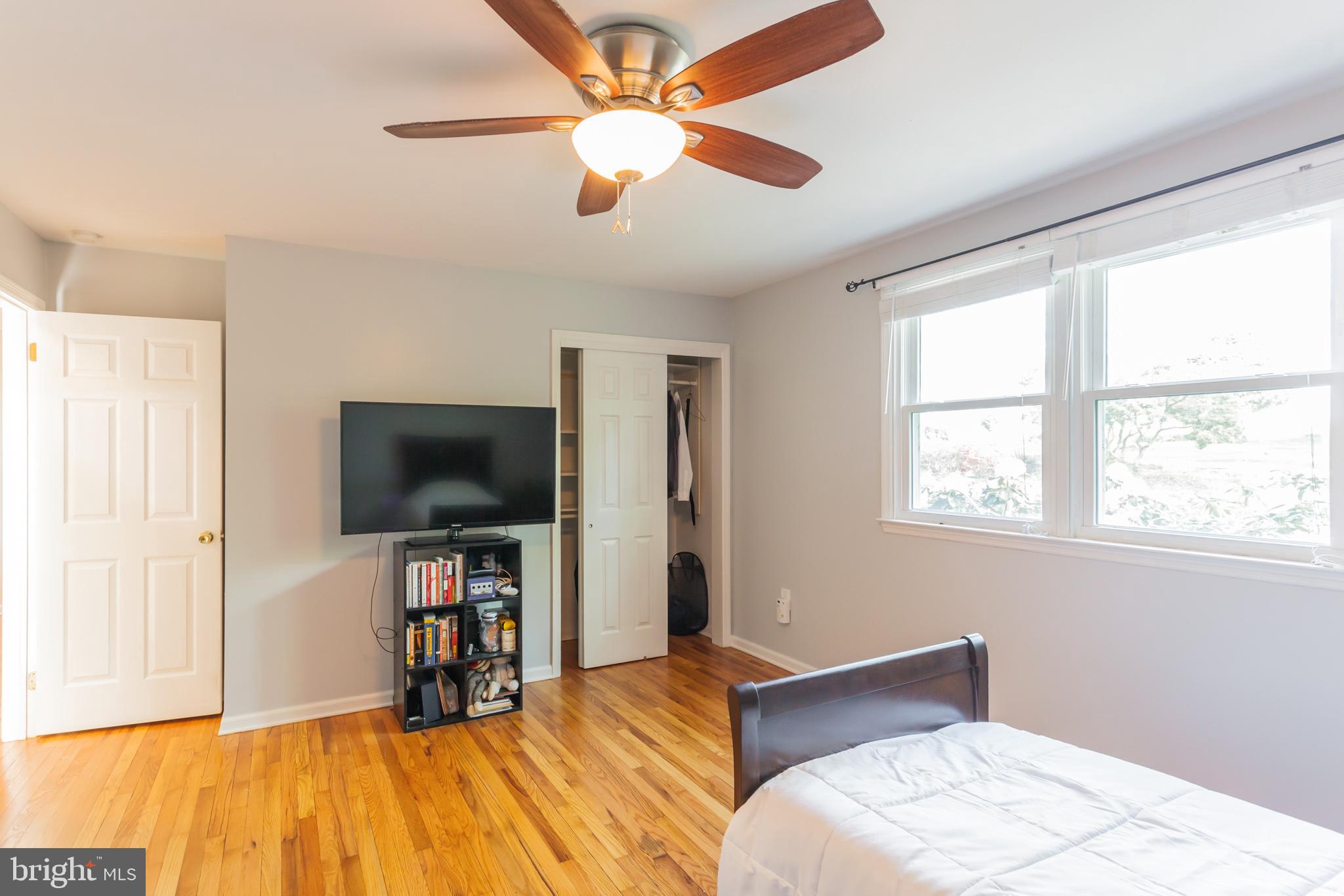 655 Chambers Rock Road Landenberg, PA 19350 - Photo 24 of 42 a bedroom with a bed and a flat screen tv