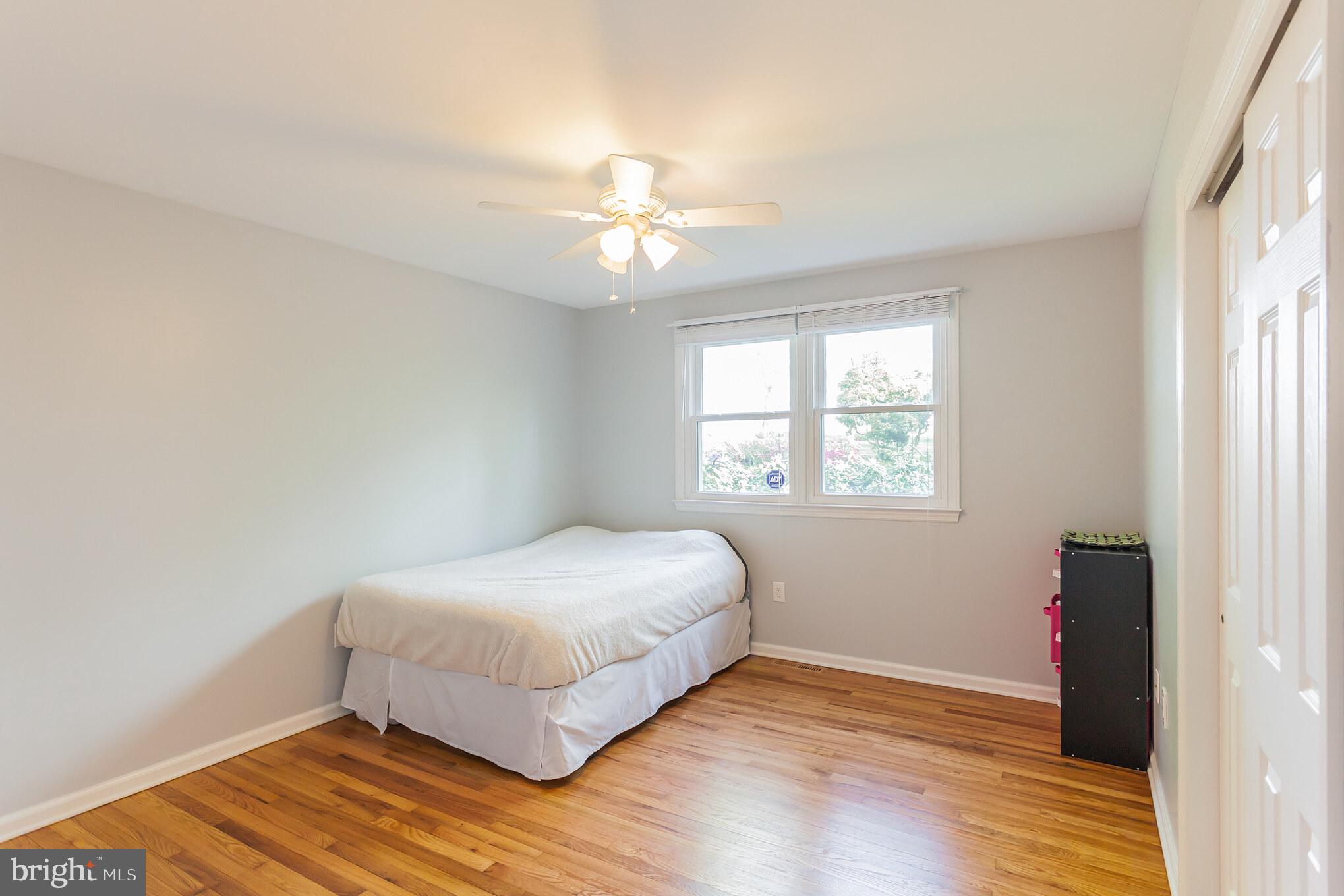 655 Chambers Rock Road Landenberg, PA 19350 - Photo 25 of 42 a bedroom with a bed and a window