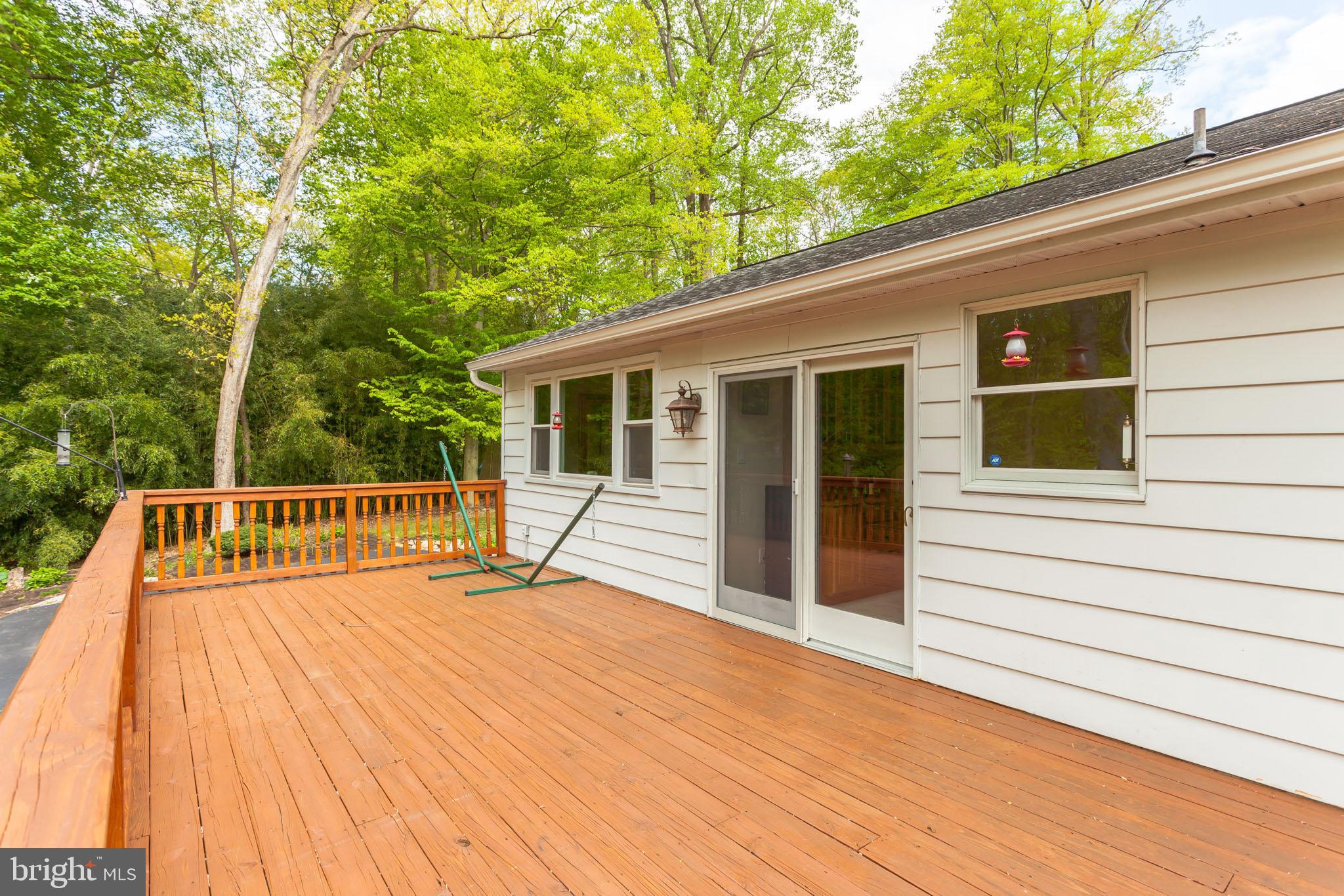 655 Chambers Rock Road Landenberg, PA 19350 - Photo 36 of 42 a view of backyard with deck and wooden floor