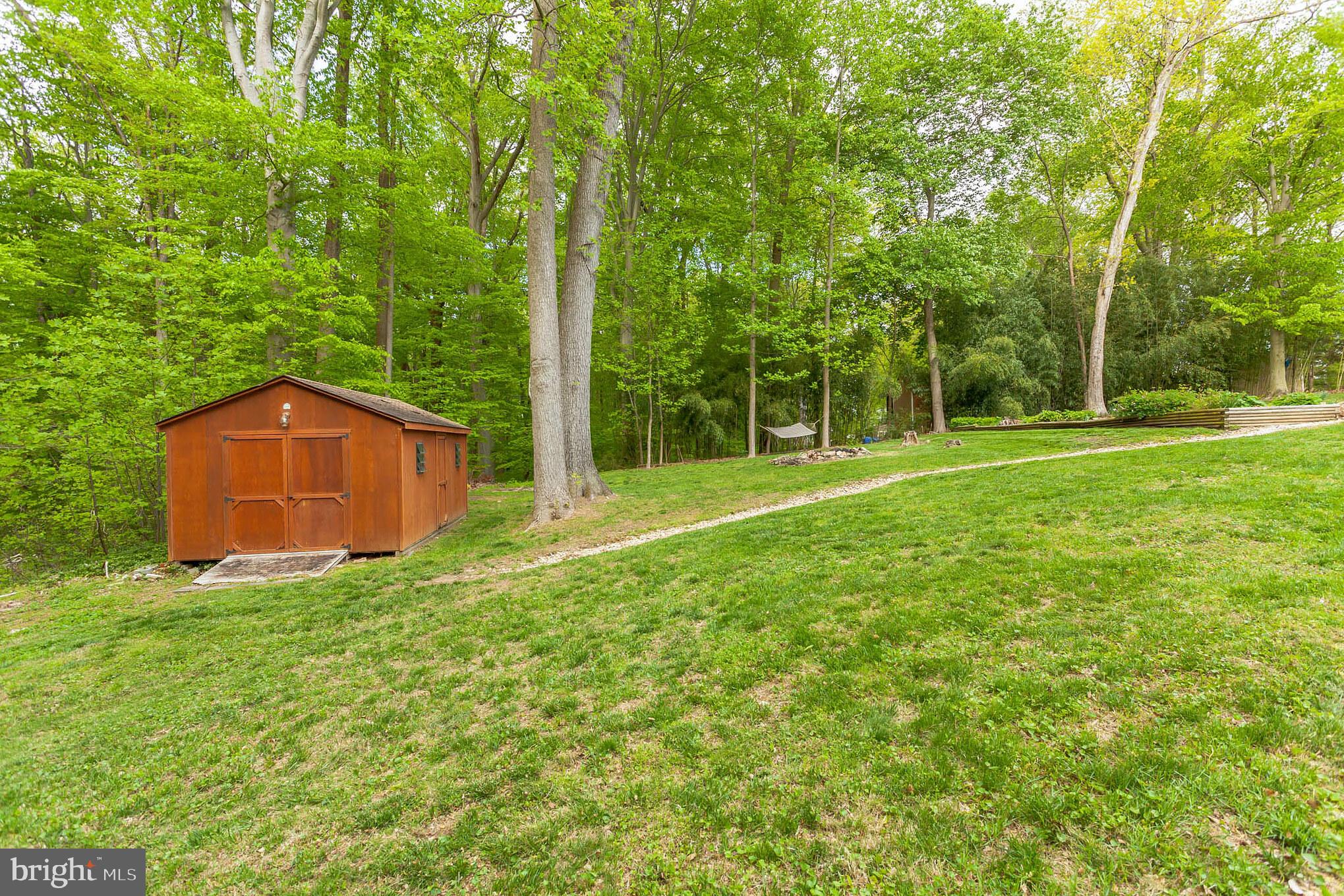 655 Chambers Rock Road Landenberg, PA 19350 - Photo 40 of 42 a view of a tree in a yard with a house