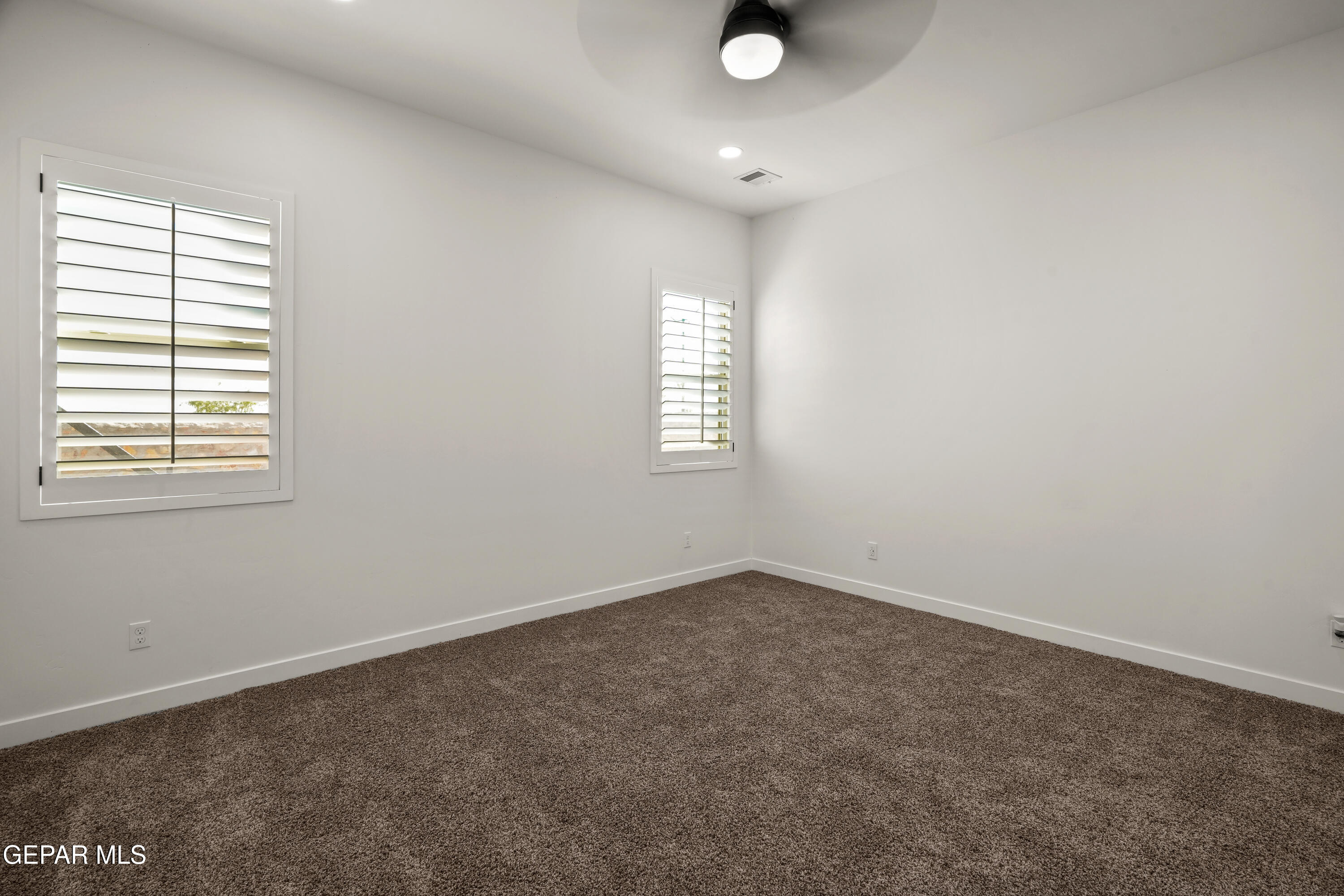 15221 Expectation El Paso, TX 79938 - Photo 27 of 38 an empty room that has a window