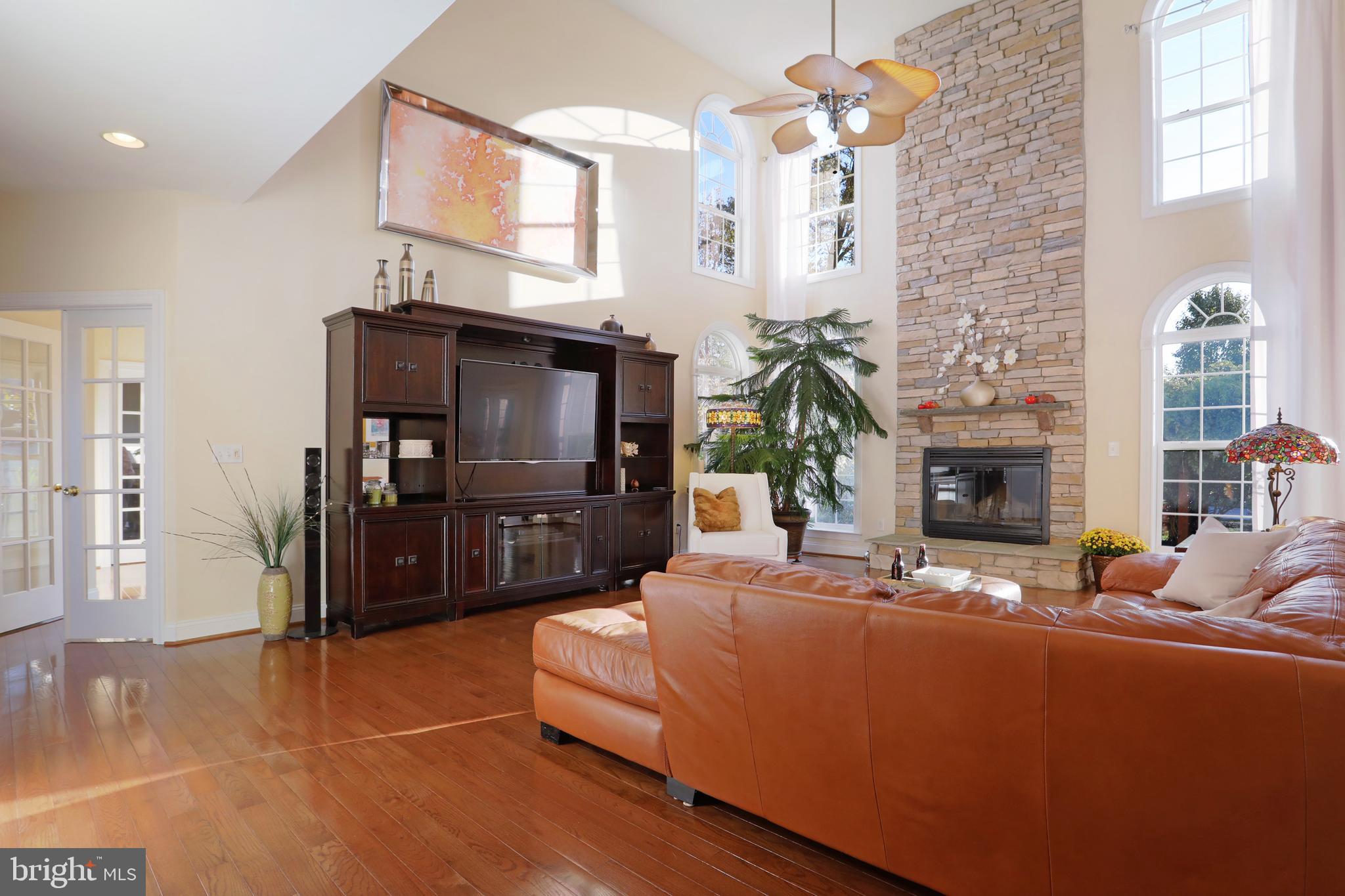 615 Rivanna Run Falling Waters, WV 25419 - Photo 18 of 46 2 Story Family Room with Stone Wood Fireplace