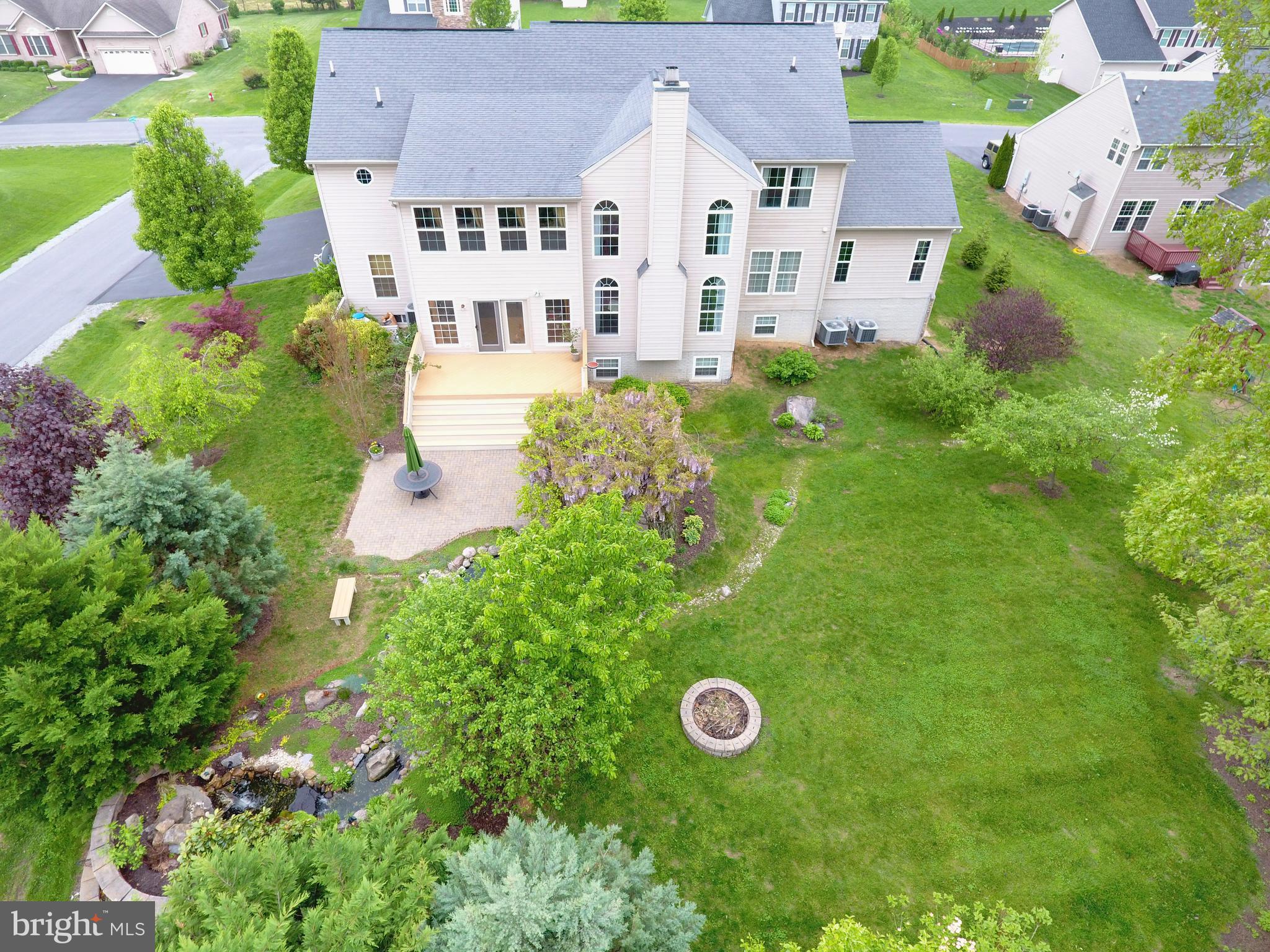 615 Rivanna Run Falling Waters, WV 25419 - Photo 45 of 46 Aerial Rear Landscape View of Deck, Patio, Pond