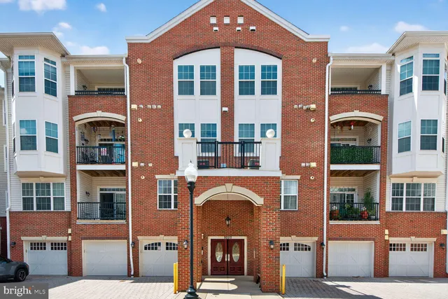 a front view of a building with a front door