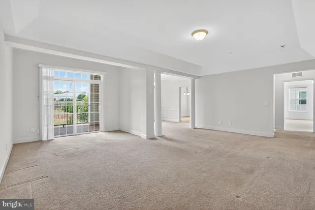 en view of an empty room with a window