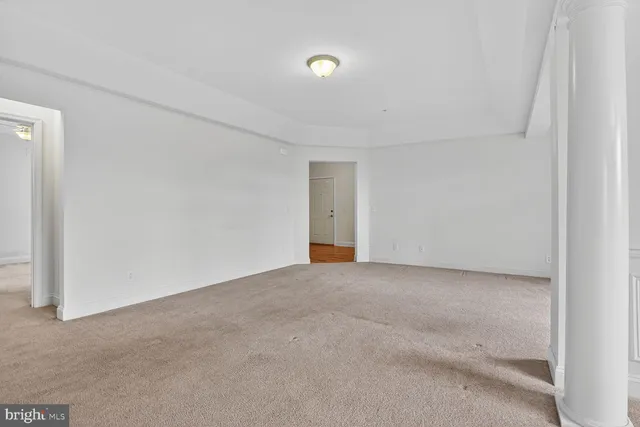 a kitchen with a stove a sink and a microwave