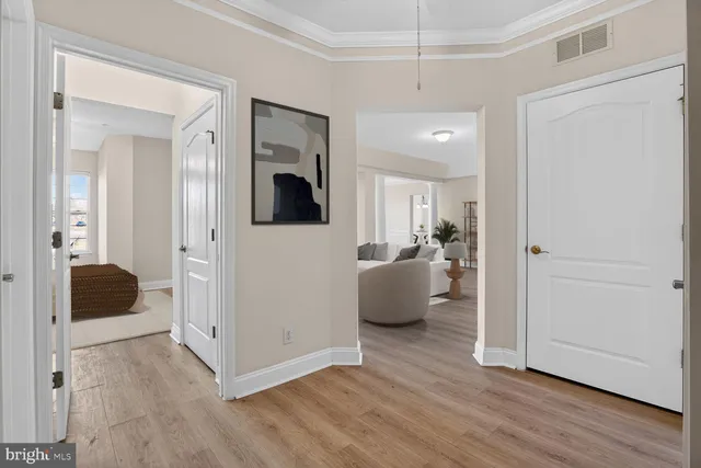 a kitchen with granite countertop a sink stove and microwave
