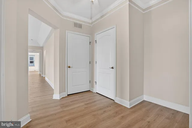 a kitchen with stainless steel appliances granite countertop a stove a refrigerator and a sink