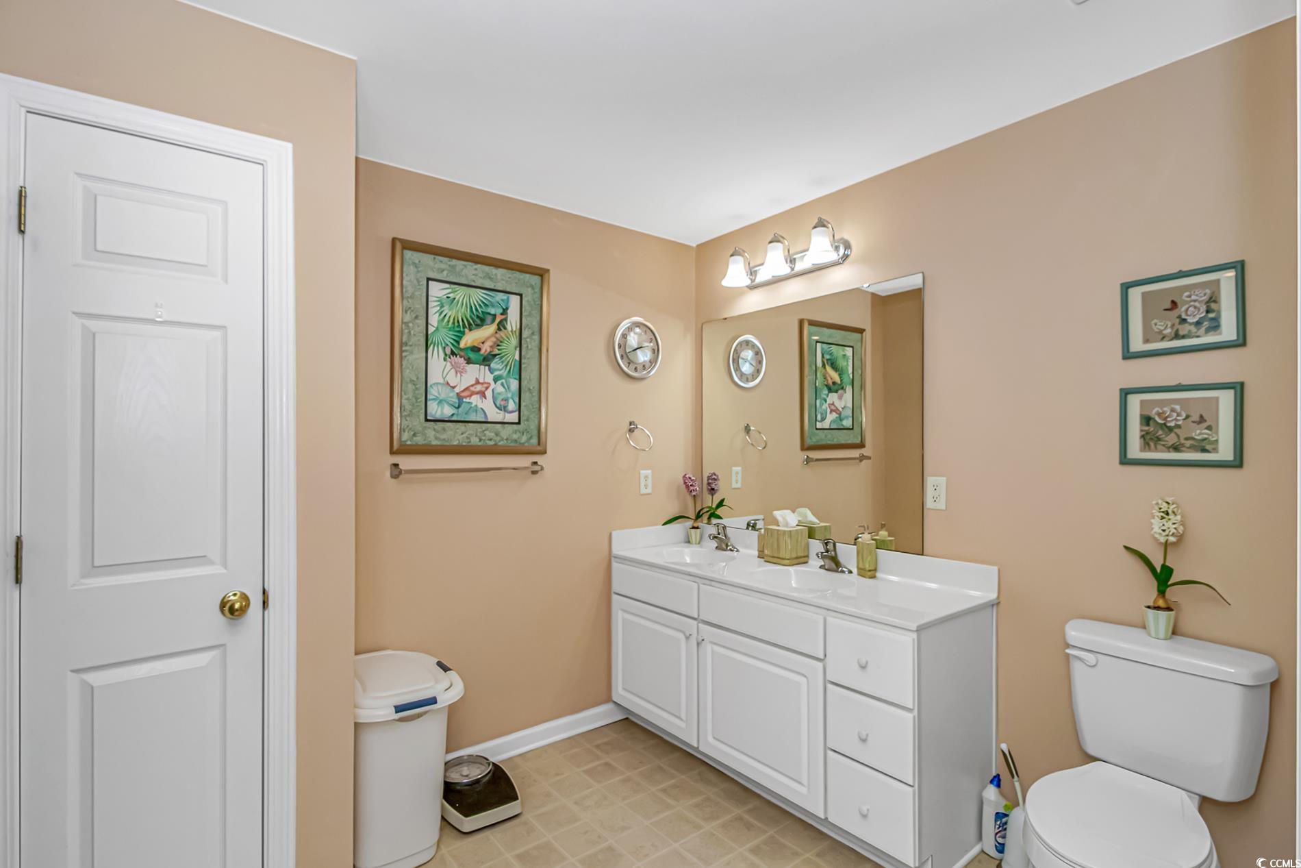 4366 Rivergate Lane, Unit 306 Little River, SC 29566 - Photo 14 of 32 Bathroom featuring toilet and vanity