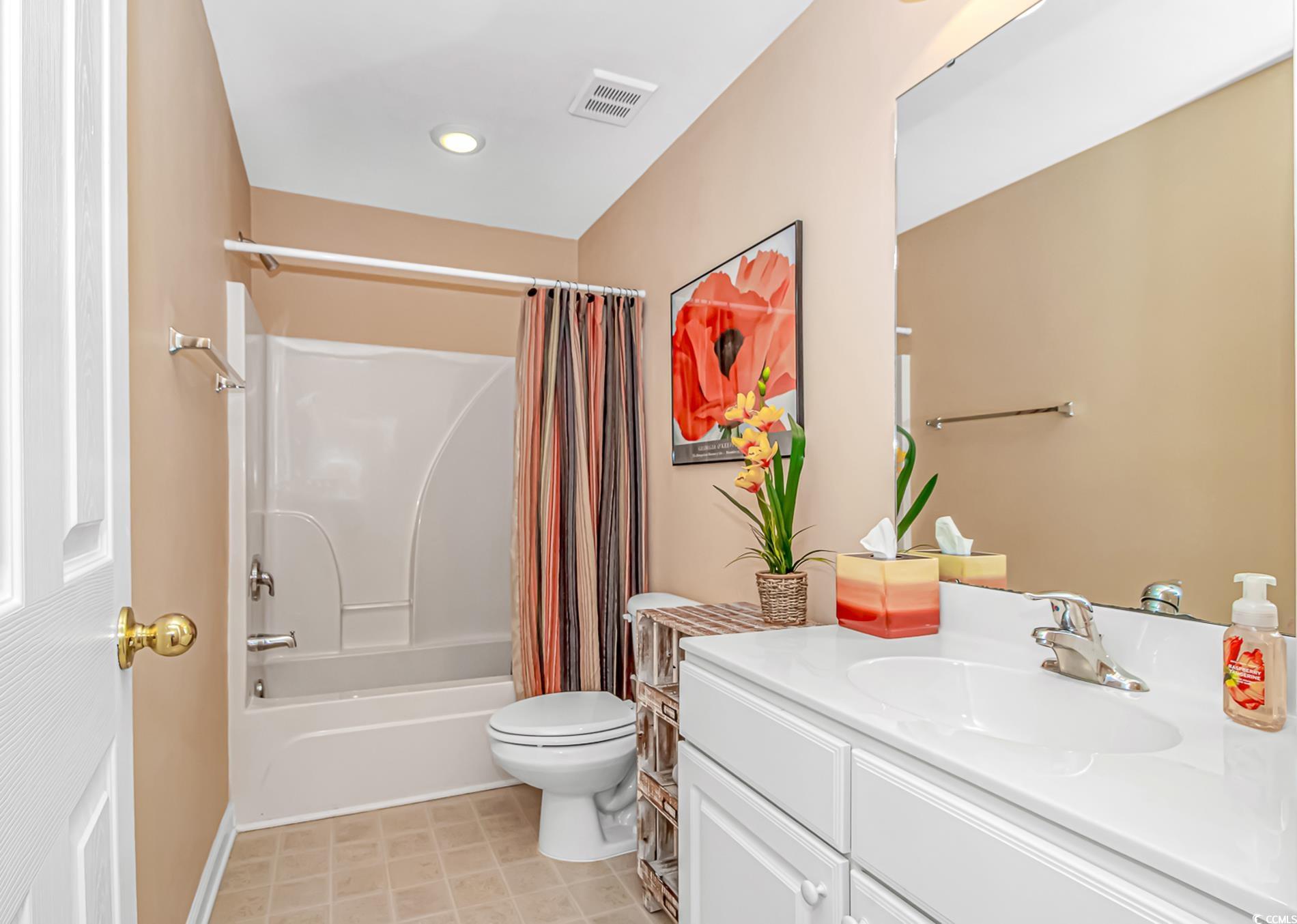4366 Rivergate Lane, Unit 306 Little River, SC 29566 - Photo 20 of 32 Bathroom featuring vanity and shower / tub combo