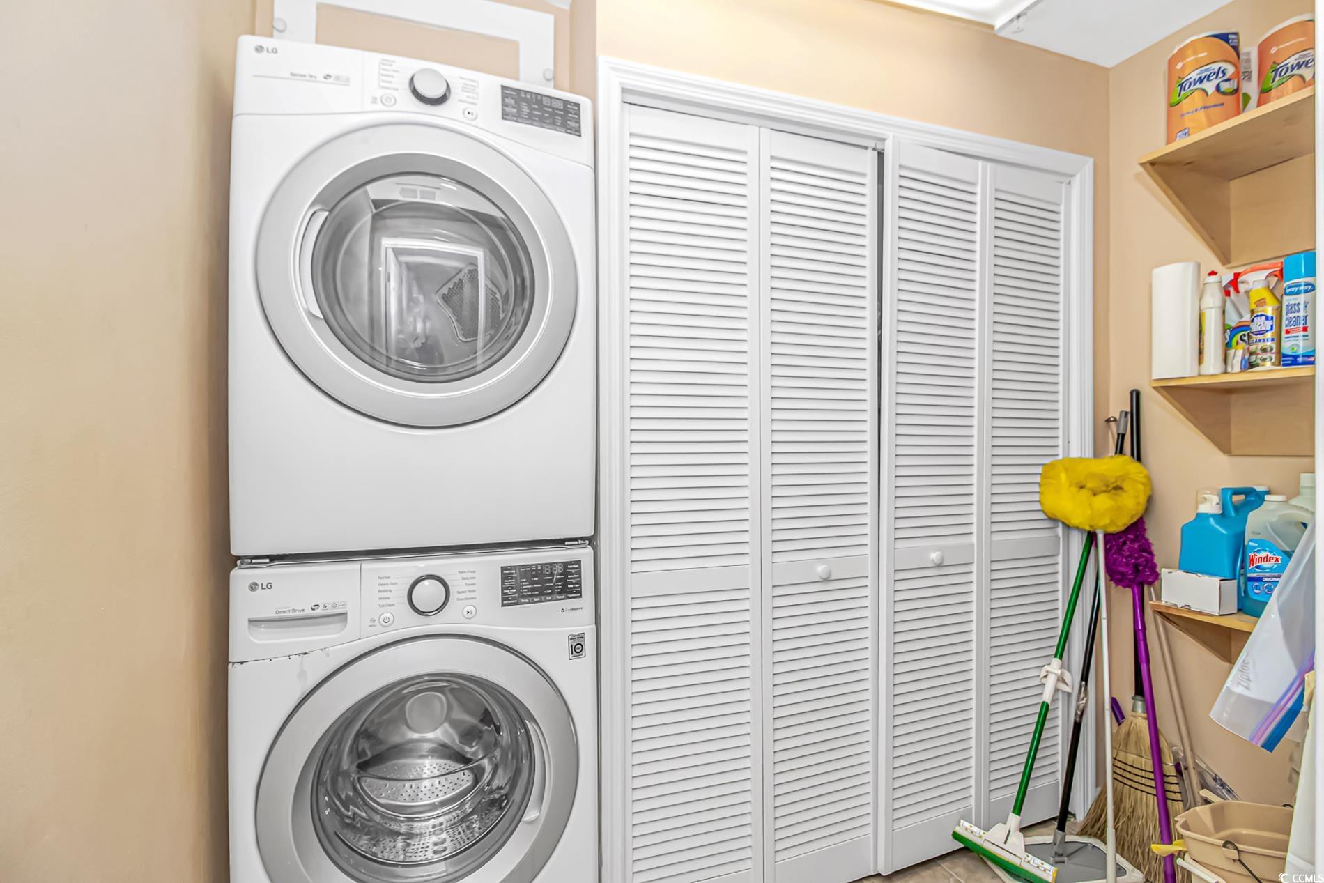 4366 Rivergate Lane, Unit 306 Little River, SC 29566 - Photo 21 of 32 Washroom with stacked washer / drying machine