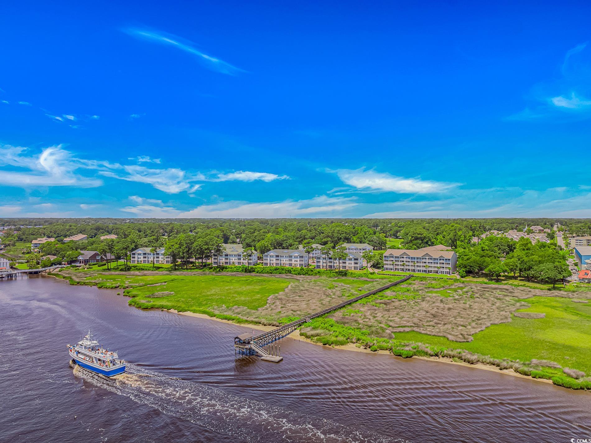 4366 Rivergate Lane, Unit 306 Little River, SC 29566 - Photo 29 of 32 Drone / aerial view of a large body of water