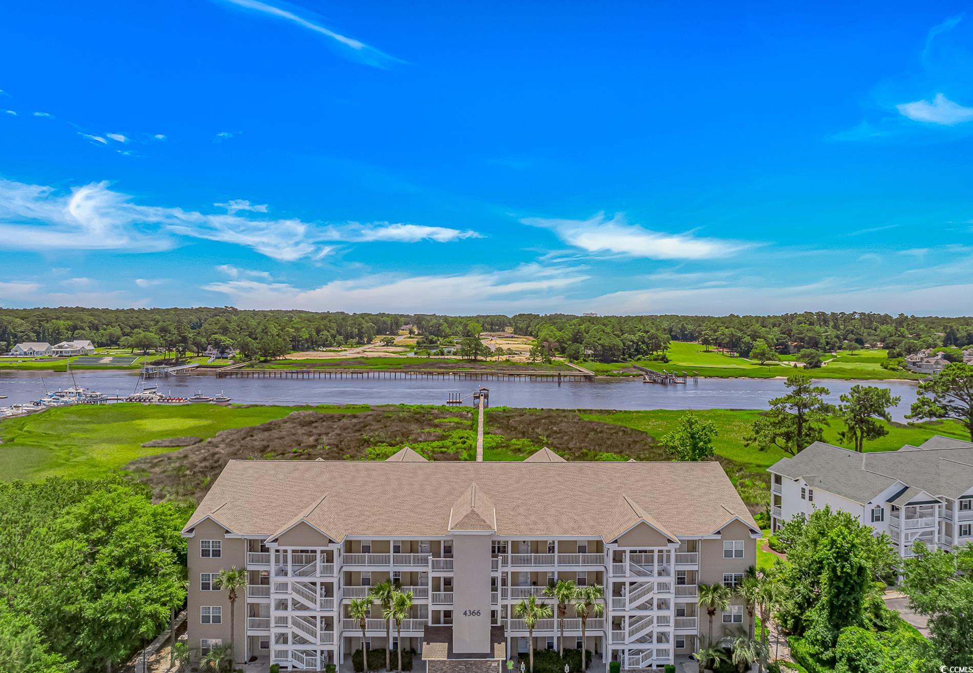 4366 Rivergate Lane, Unit 306 Little River, SC 29566 - Photo 31 of 32 Drone / aerial view of a large body of water