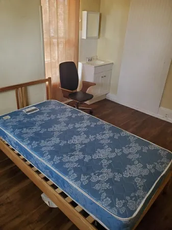 a room with a table and chairs
