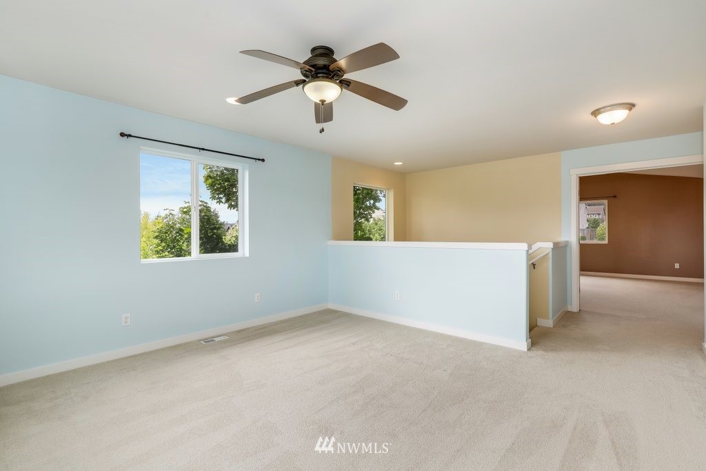 3705 224th Street Southeast Bothell, WA 98021 - Photo 22 of 35 a view of an empty room with a window